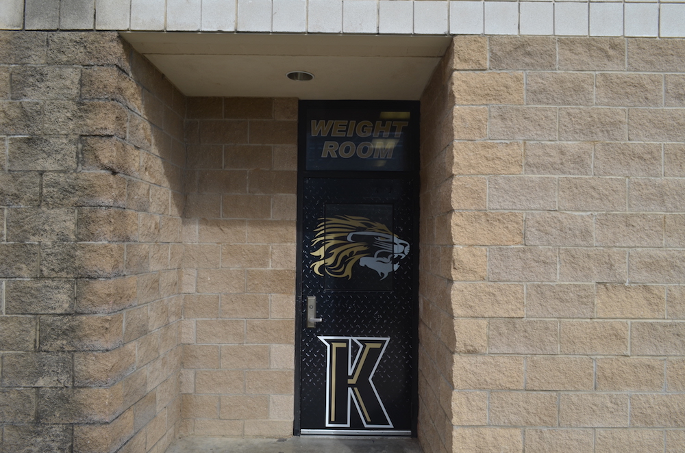 athletic facility door wraps Kaufman Lions