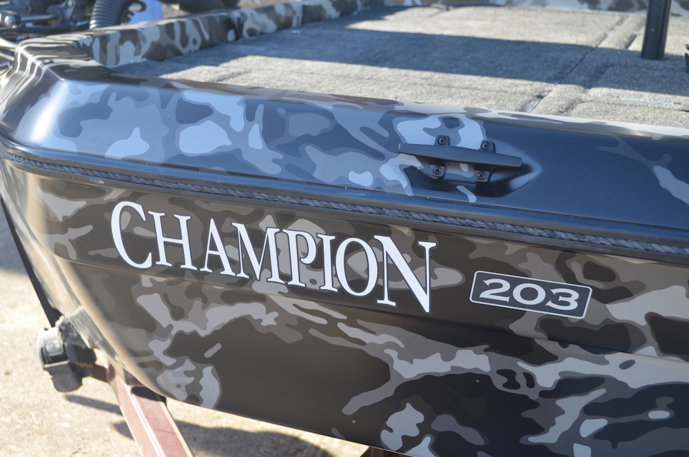 camouflage fishing boat wrap