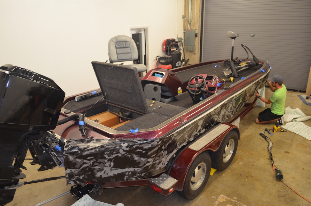 during camouflage fishing boat wrap