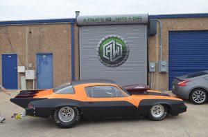 matte black finish wrapped drag car
